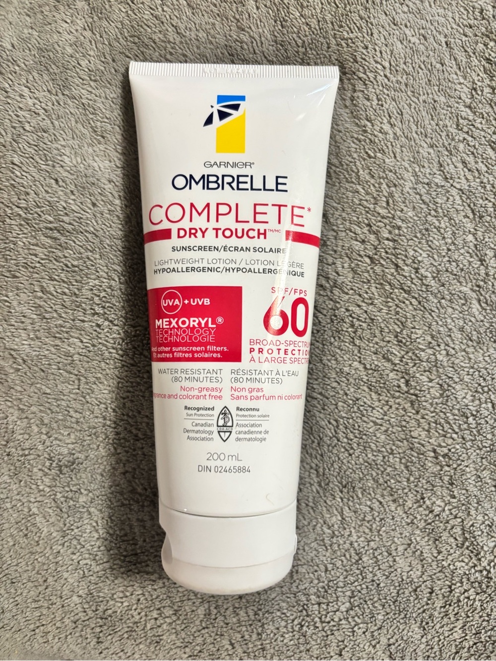 Garnier White Sunscreen Tube with Black Text